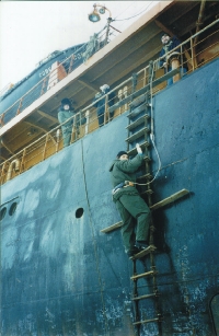 This is a photo of a scientist who is climbing on board of the icebreaker 'Soviet Union'
